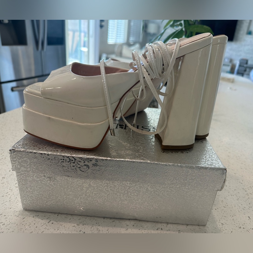 Chunk white lace up high heels